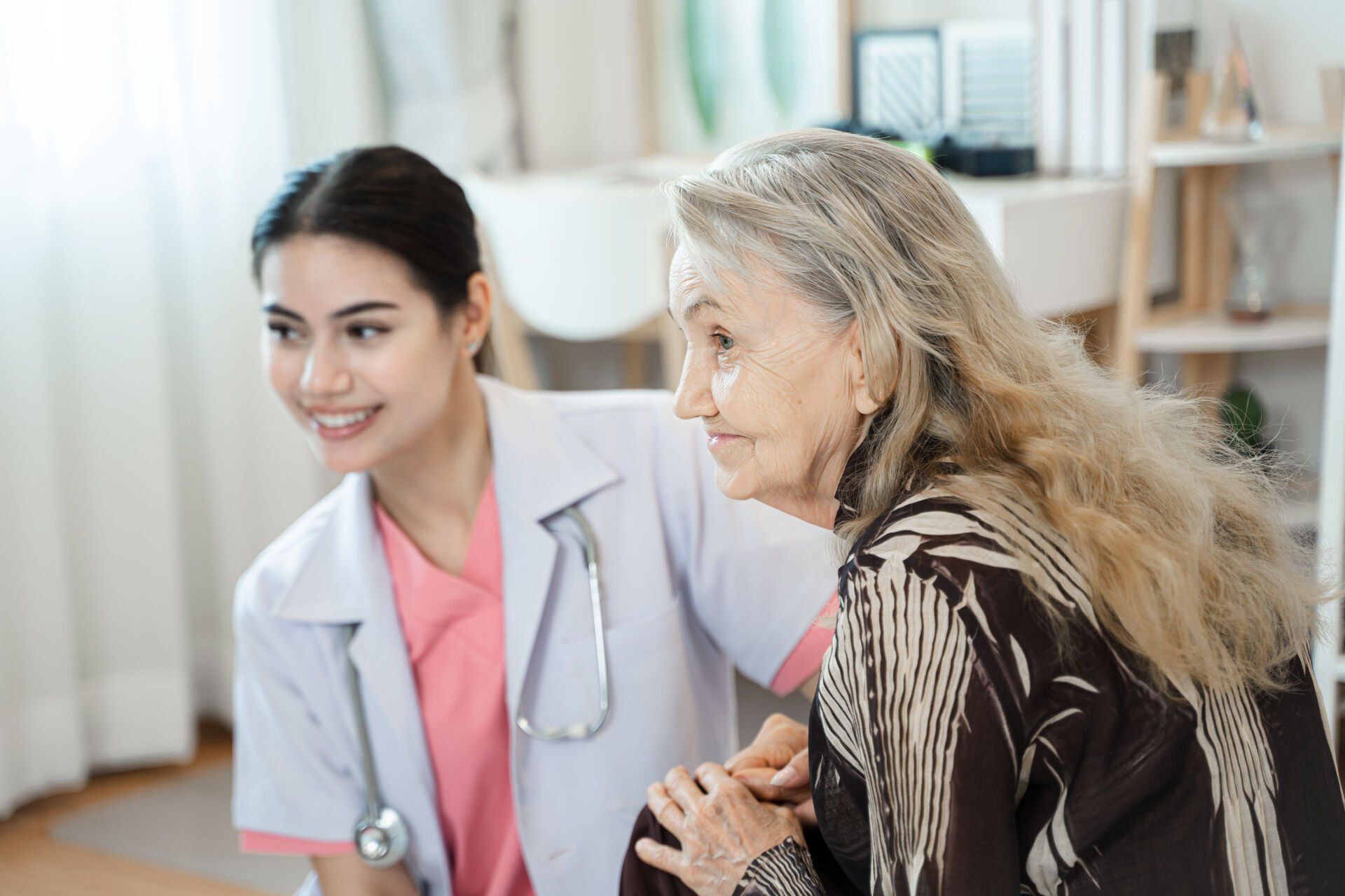 senior-care-assistant-with-cheerful-disabled-woman-2023-11-27-05-33-12-utc